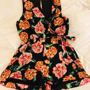 NWOT Romper size X-Large black with flowers print